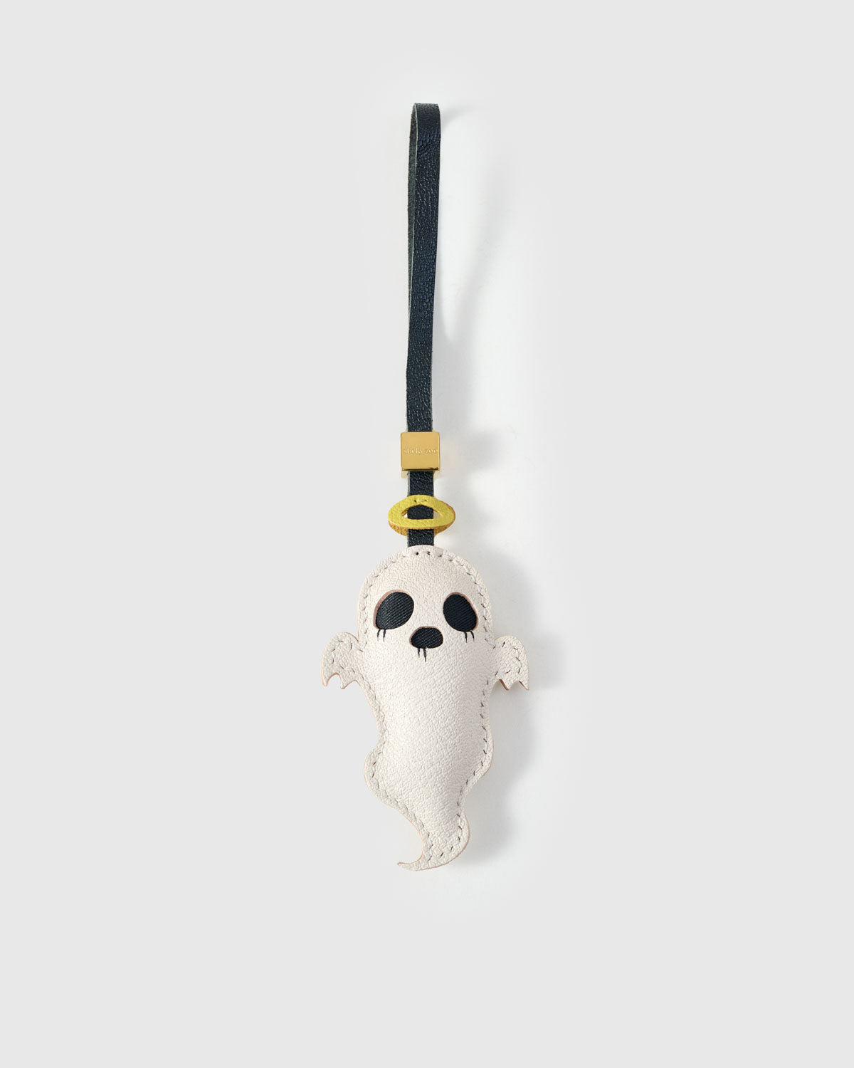 Softly spooky, utterly sweet. A little ghost with a golden halo