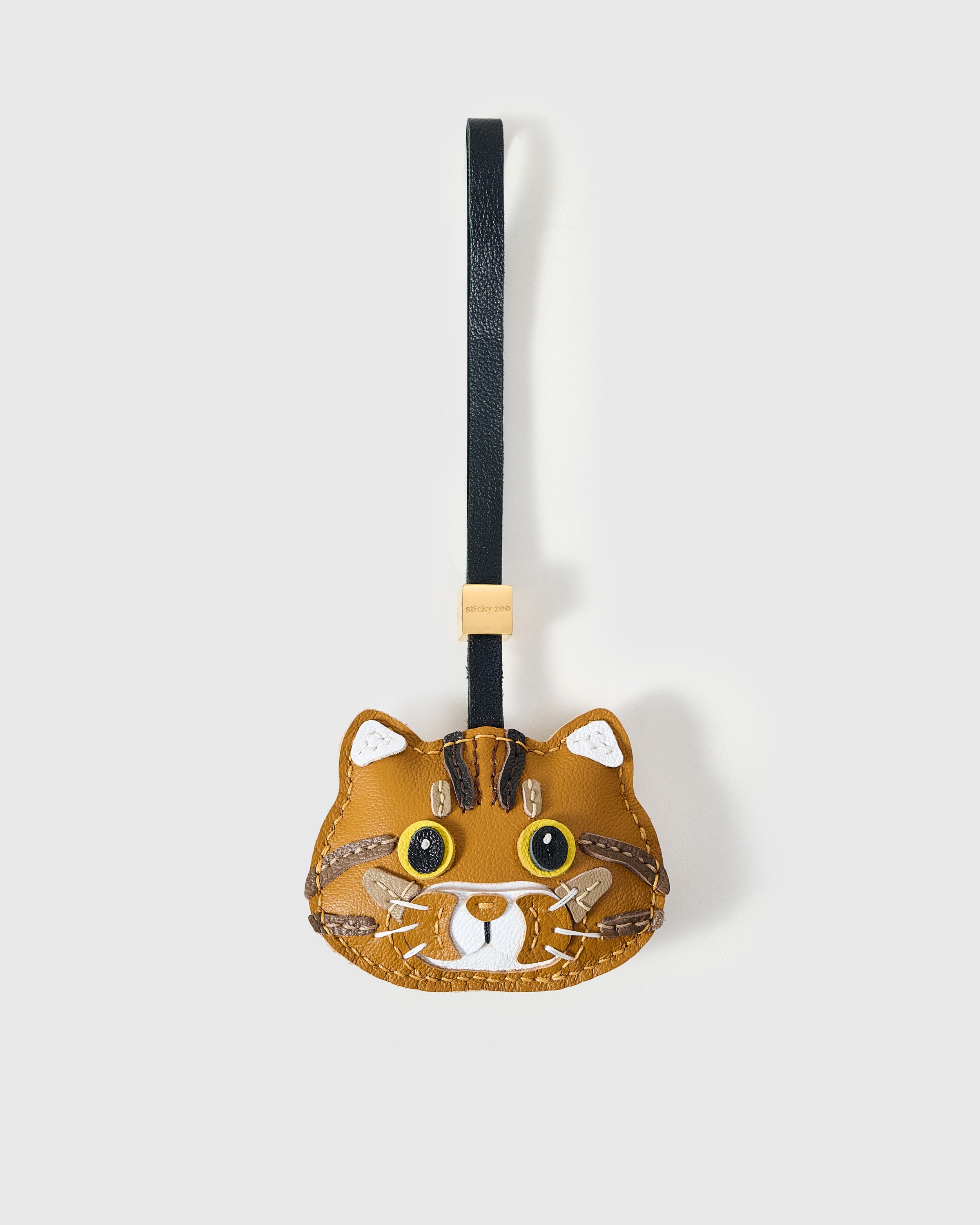 No.2844 ジャンピングねこのチャーム Ginger Tabby Leather Charm — Hand-Cut French Leather | STICKYZOO