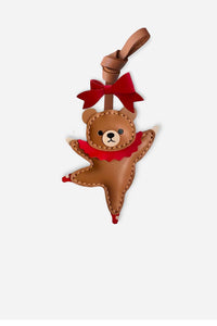 BALLET BEAR CHARM charm handmade from French Alran genuine goatskin — A caramel bear, mid-pirouette, in a red tutu. One leg. Three days by hand. Arrives in luxury gift packaging. Designed in Amsterdam.