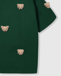Detail of body and sleeve on STICKYZOO green Bear T-Shirt showing plush bears at different angles