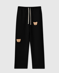 STICKYZOO Sticky Bear Sweatpant in black with two hand-stitched 3D plush teddy bear face appliques