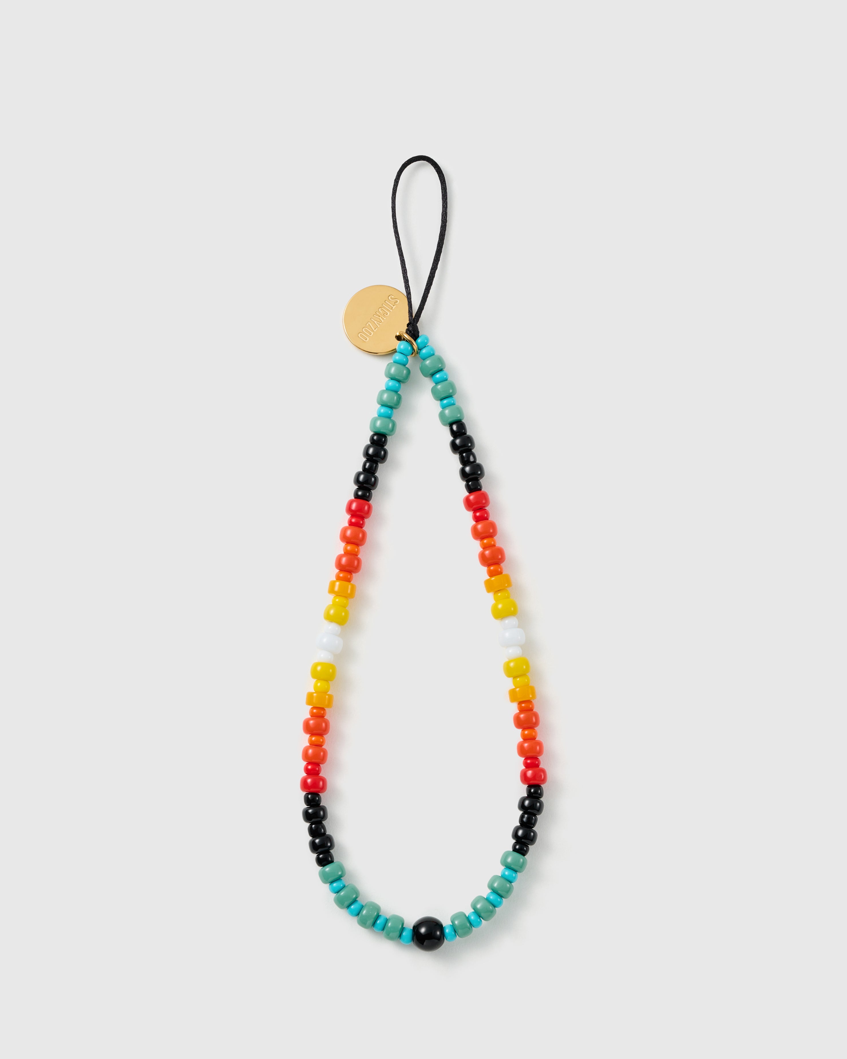 STICKYZOO multicolour beaded phone strap laid flat — opaque pony beads in turquoise, red, orange, yellow, white and black on a black cord loop.