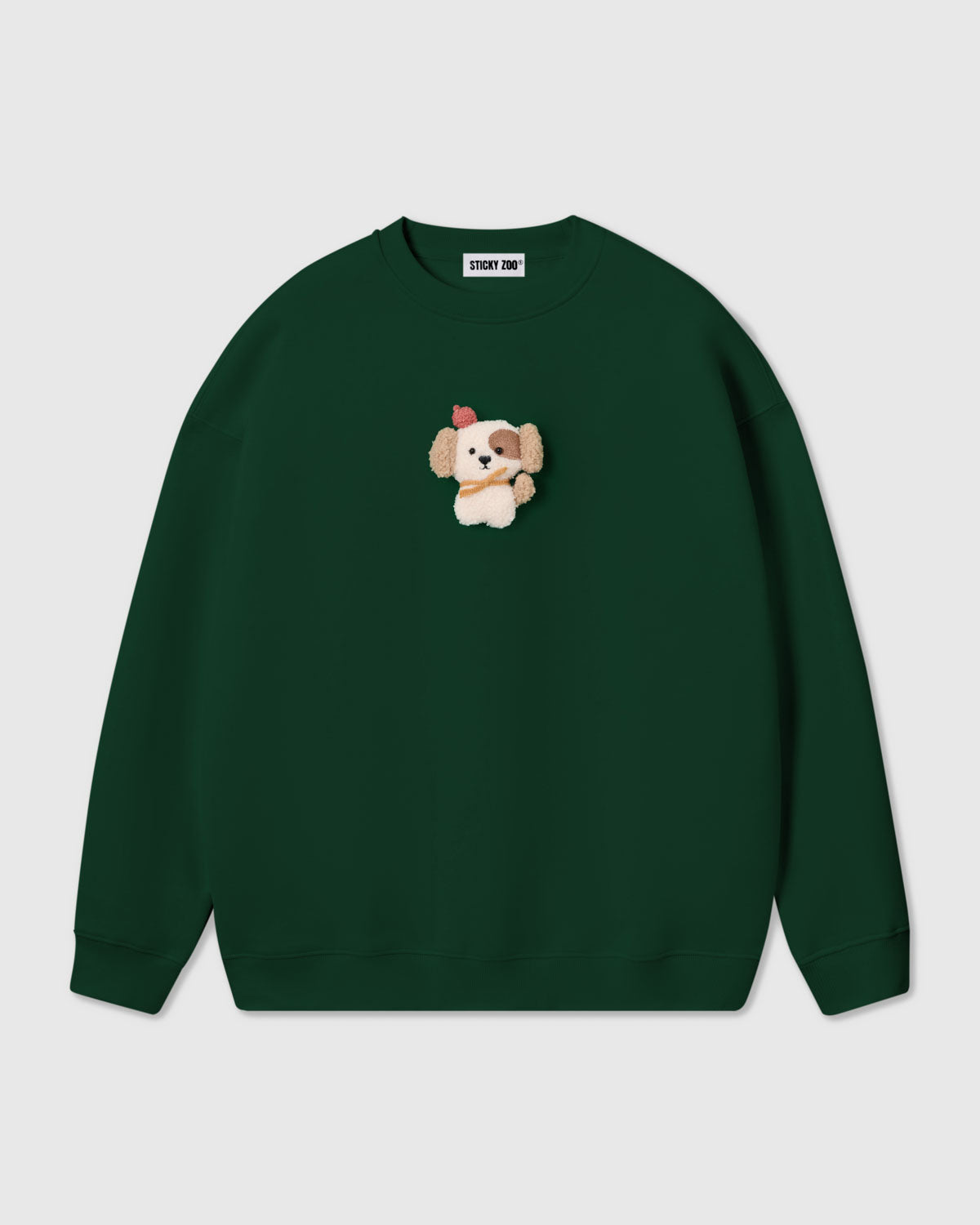 {{Plush puppy in green}} STICKYZOO CARDINAL PUPPY SWEATSHIRT in Green featuring one hand-stitched plush puppy appliqué, designed in Amsterdam