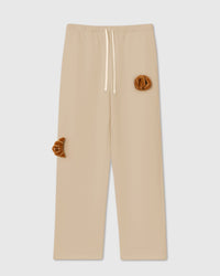 STICKYZOO DOUBLE CROISSANT PLUSH SWEATPANTS in Cream featuring 2 hand-stitched plush croissants, designed in Amsterdam