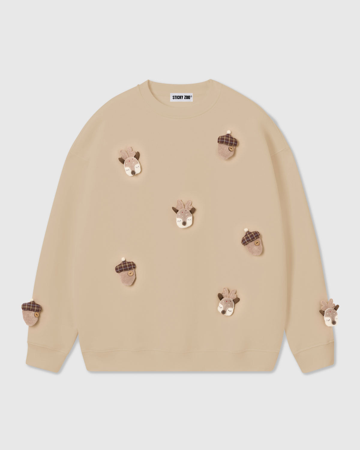 {{7 reindeer & acorns in cream}} STICKYZOO REINDEER & ACORN PLUSH SWEATSHIRT in Cream featuring 7 hand-stitched plush reindeer & acorns, designed in Amsterdam