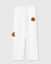 STICKYZOO DOUBLE CROISSANT PLUSH SWEATPANTS in White featuring 2 hand-stitched plush croissants, designed in Amsterdam