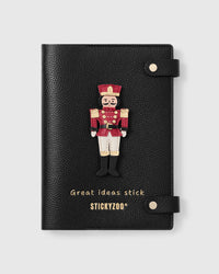 STICKYZOO Nutcracker Notebook with hand-cut French Alran leather charm on black genuine goatskin cover, gold snap closure