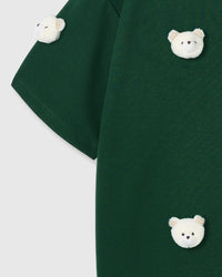 Multiple check-ear bear appliques on STICKYZOO green tee showing dimensional scatter