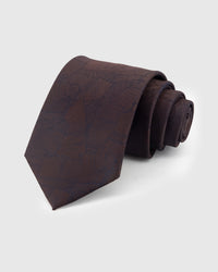 COCOA MOSAIC TIE — Hand-embroidered abstract mosaic detail on 100% mulberry silk in cocoa, showing embroidery texture and silk sheen