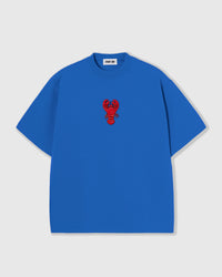 STICKYZOO Lobster T-Shirt in blue with a hand-beaded red lobster applique, oversized unisex fit.