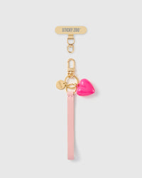 Handmade French Alran pale pink leather phone strap with glossy hot pink puff heart charm and 18K gold STICKYZOO hardware