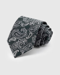EVERGREEN PAISLEY TIE — Hand-embroidered paisley detail on 100% mulberry silk in evergreen, showing embroidery texture and silk sheen