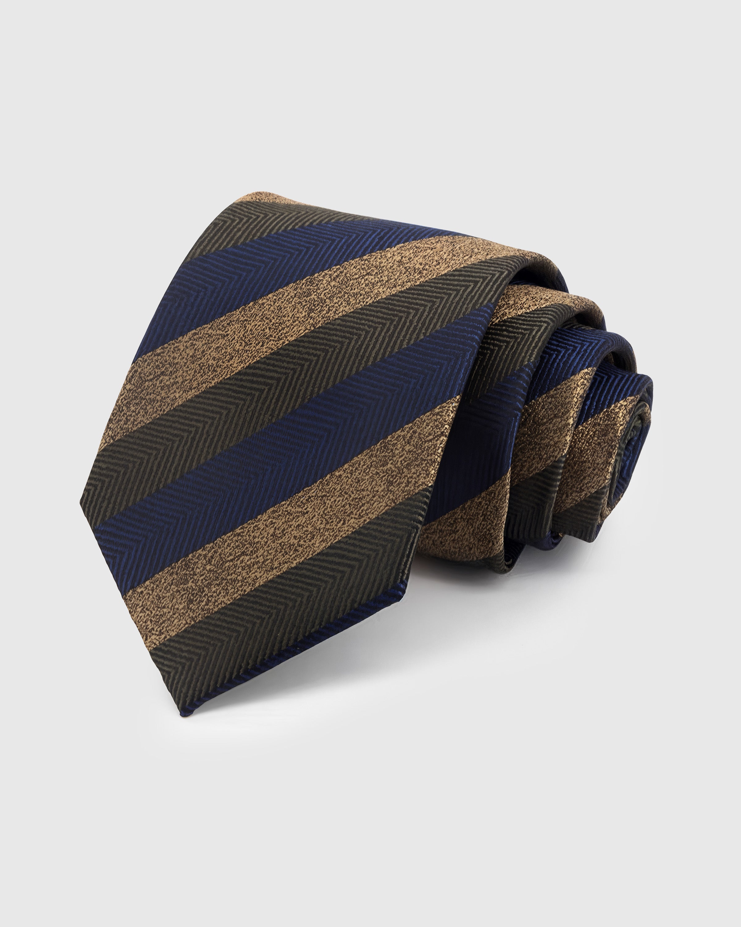 NAVY HERRINGBONE TIE — Hand-embroidered herringbone stripe detail on 100% mulberry silk in navy, showing embroidery texture and silk sheen