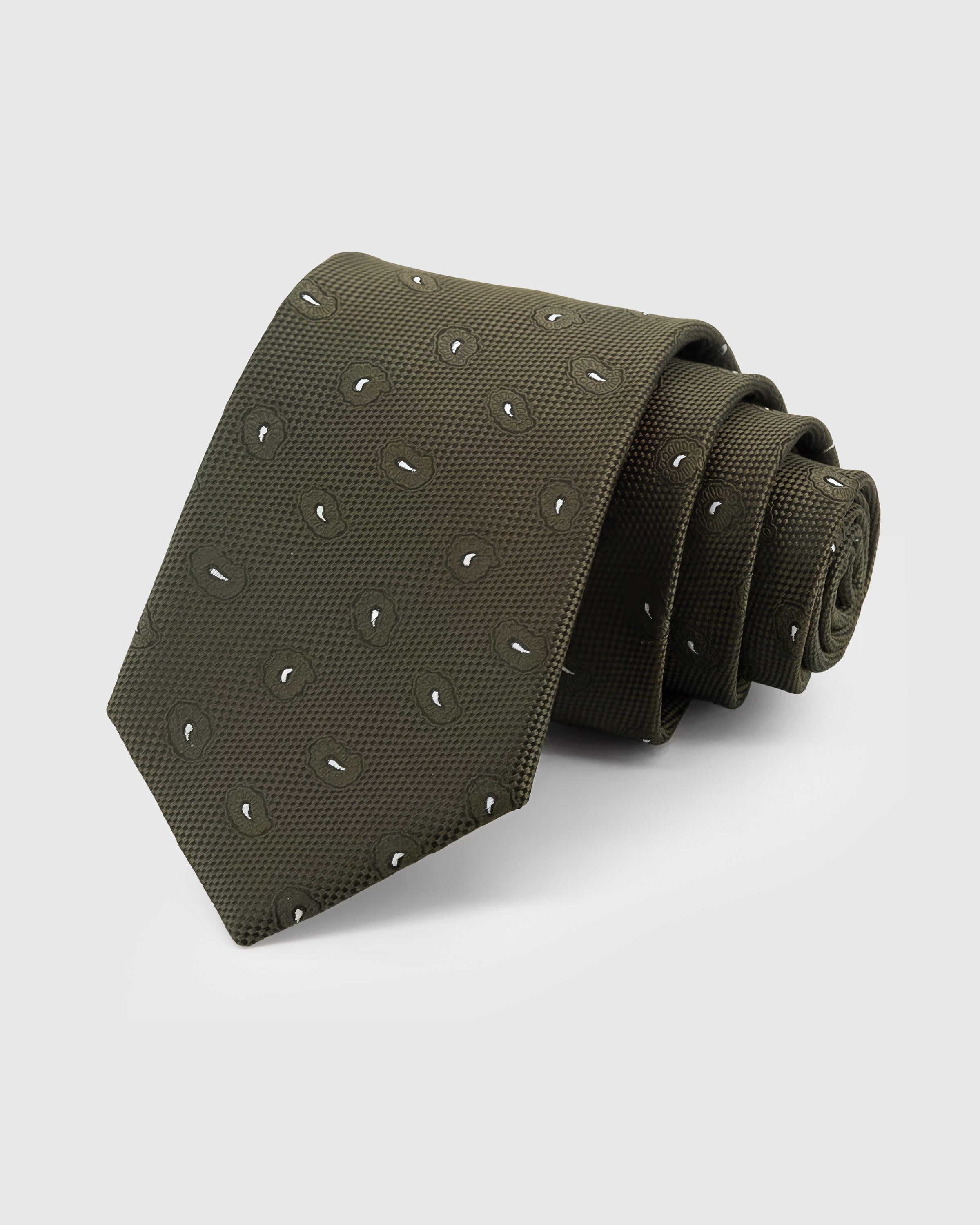 STICKYZOO Moss Paisley Tie in hand-embroidered mulberry silk with white paisley drops on olive ground, 45° bias-cut Italian method