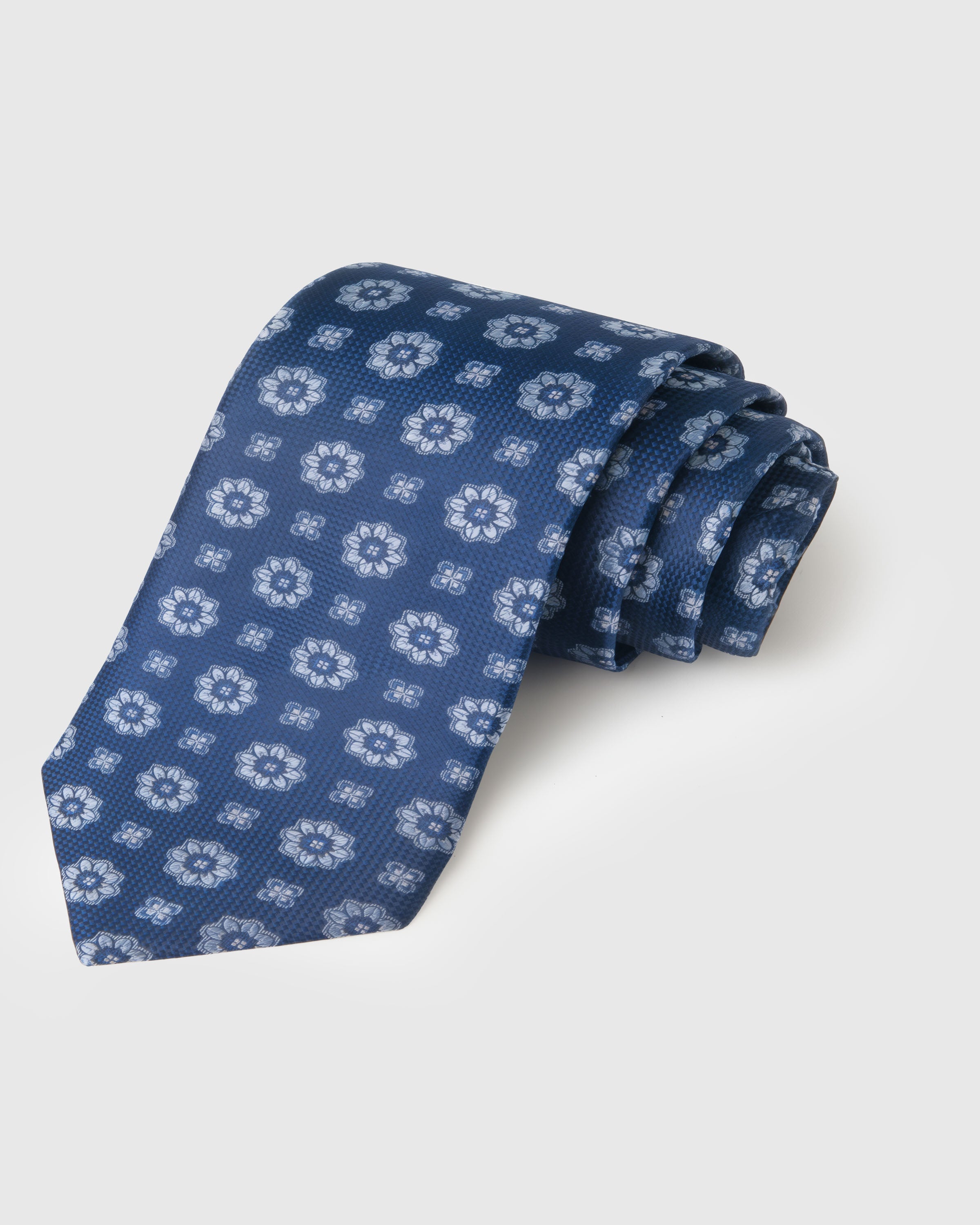 STICKYZOO Steel Blue Floral Tie — hand-embroidered steel blue mulberry silk with repeat floral pattern