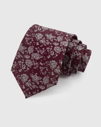 STICKYZOO WINE DITSY TIE — 100% mulberry silk with hand-embroidered silver-tone scattered ditsy floral and leaf motifs on rich wine burgundy ground