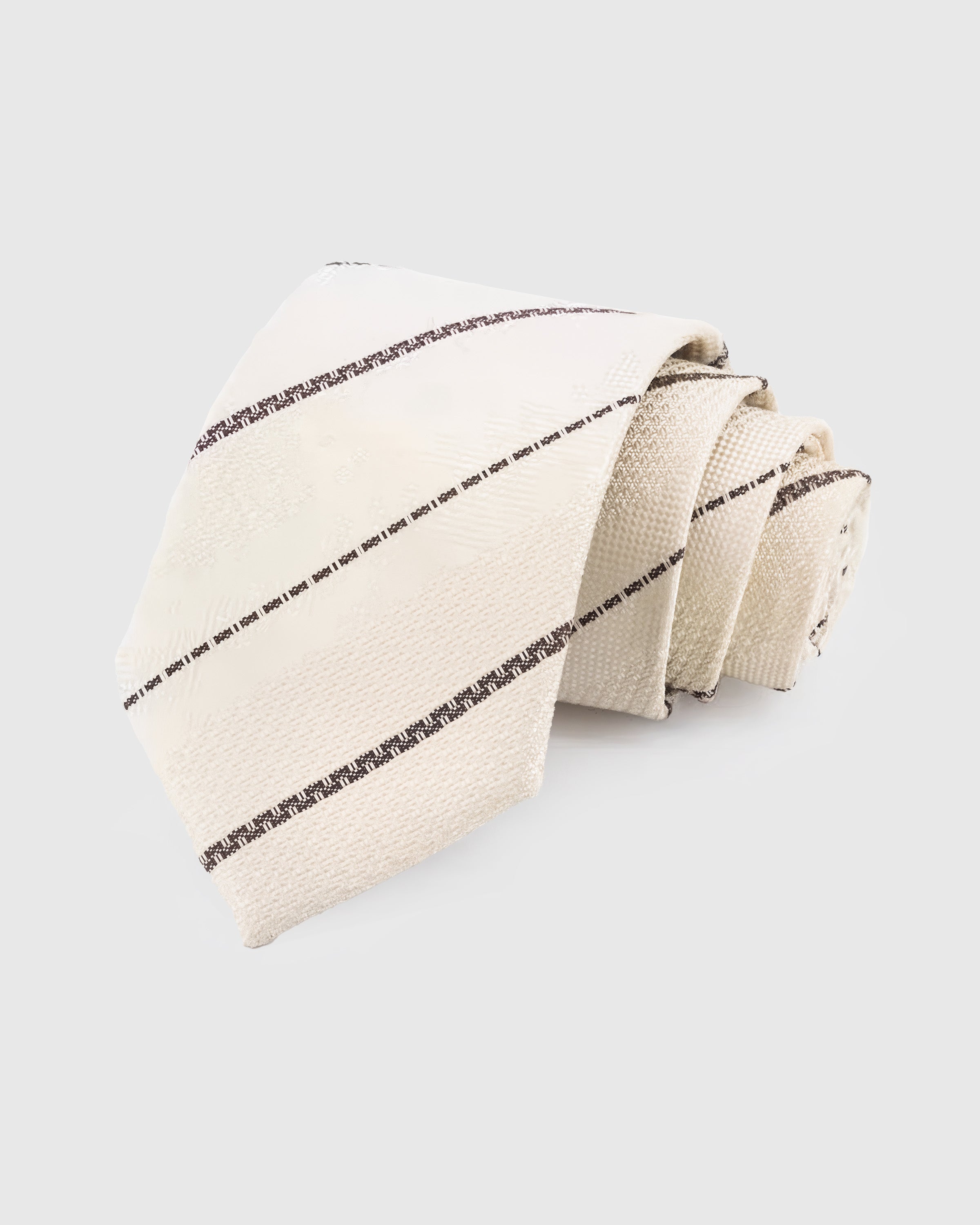 STICKYZOO Ivory Pinstripe Tie in hand-embroidered mulberry silk with charcoal pinstripes on textured cream ground, 45° bias-cut