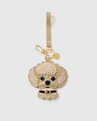 18K gold-plated clasp, key ring, and engraved STICKYZOO disc. French Alran goatskin with hand-cut alcantara suede curls and burgundy collar.