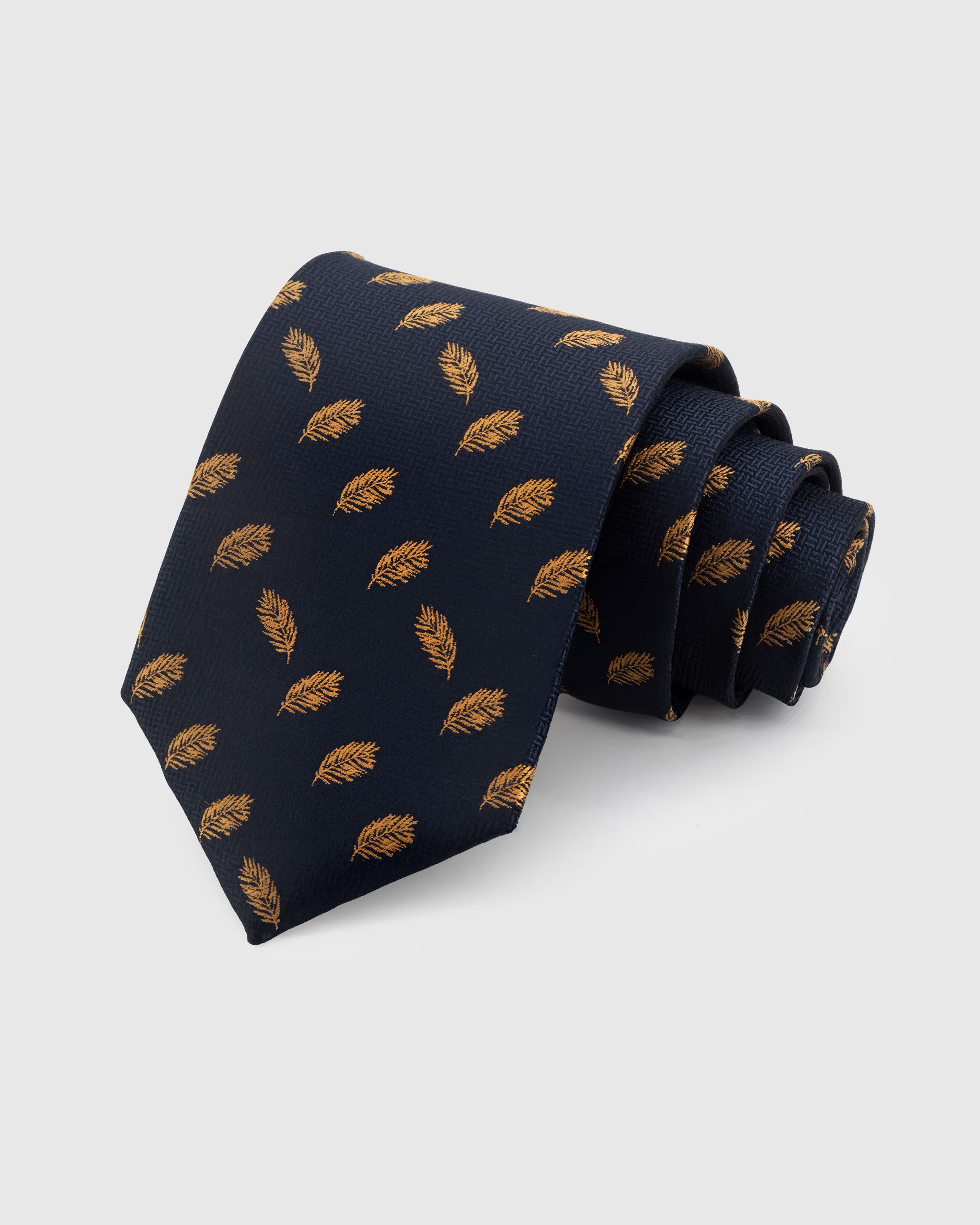 STICKYZOO NAVY FEATHER TIE — 100% mulberry silk with hand-embroidered golden amber floating feather motifs on deep navy with fine weave ground