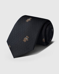 100% mulberry silk STICKYZOO Noir Terrier Tie in black with hand-embroidered terrier motifs on geometric weave, rolled