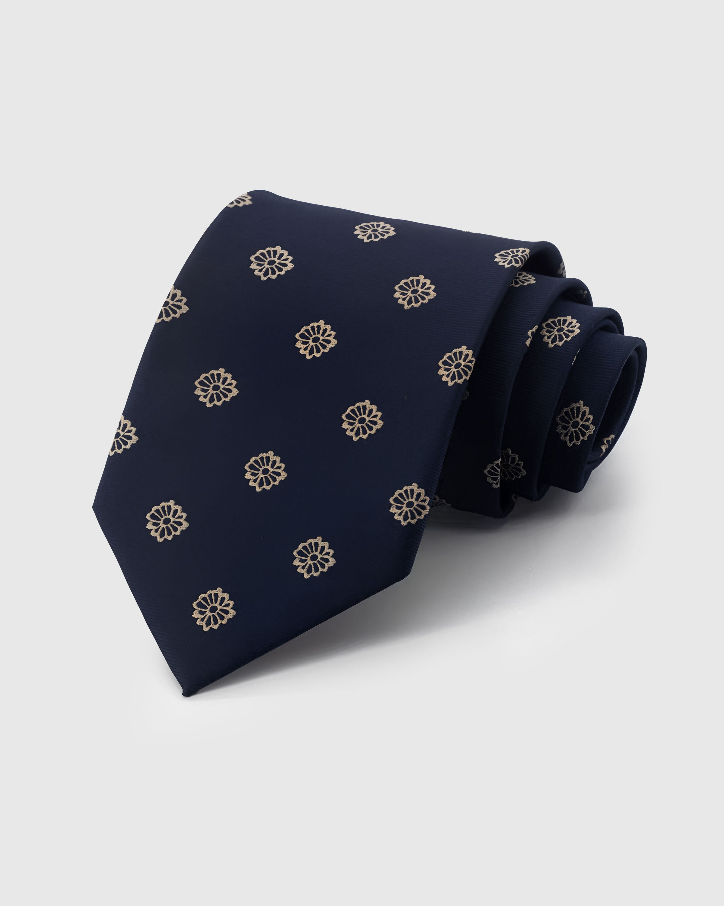 {100% mulberry silk weave} STICKYZOO MIDNIGHT ROSETTE TIE in hand-embroidered mulberry silk with rosette motif, 45° bias-cut Italian method