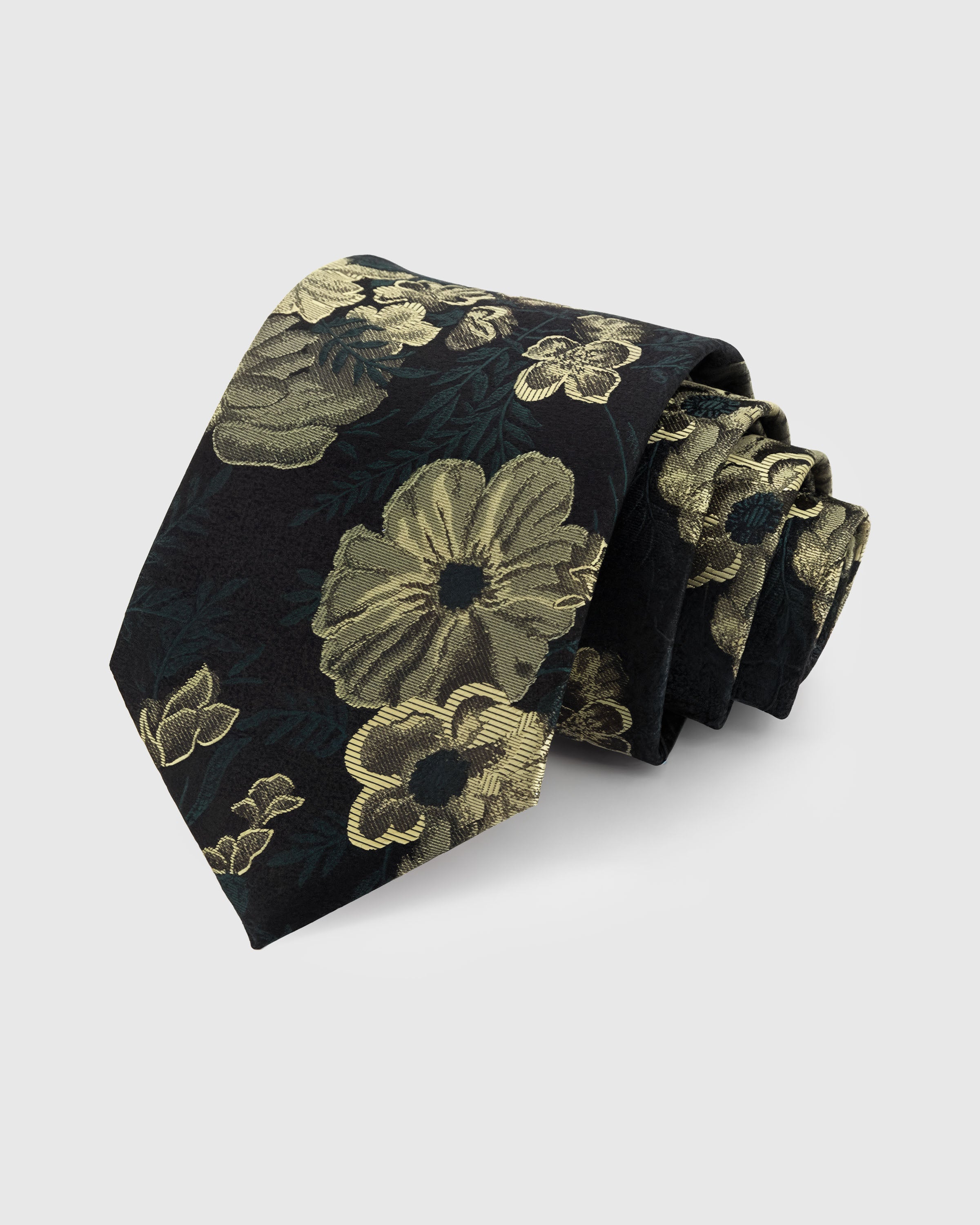 STICKYZOO NOIR BOTANICAL TIE — 100% mulberry silk with hand-embroidered gold-toned botanical blooms and foliage on deep black with dark green undertones ground