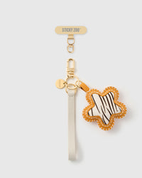 STICKYZOO zebra star leather phone strap — zebra calf-hair star in amber leather, ivory Alran strap, gold hardware