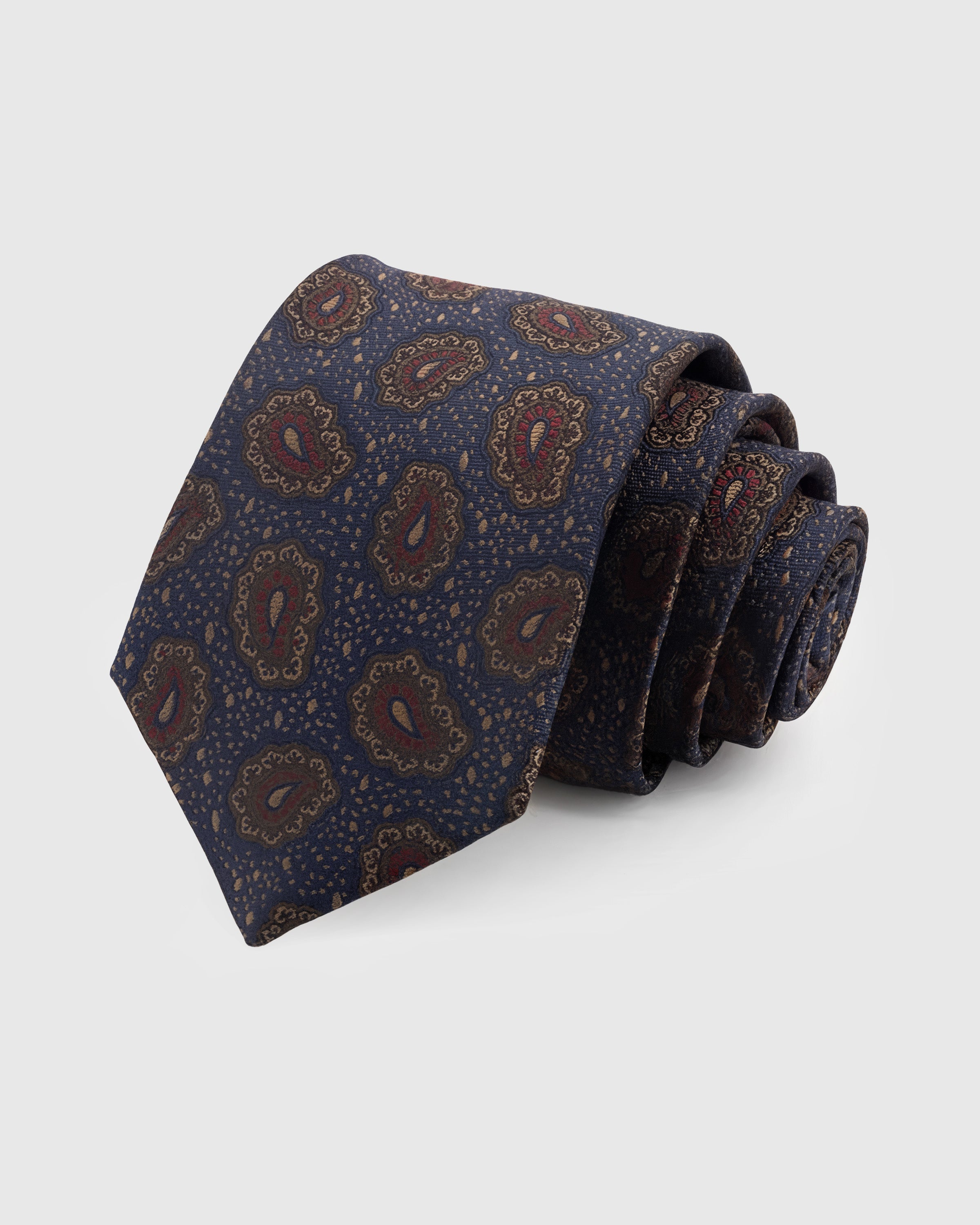STICKYZOO Midnight Ornate Paisley Tie in hand-embroidered mulberry silk with burgundy and gold ornate paisley on deep navy ground, 45° bias-cut