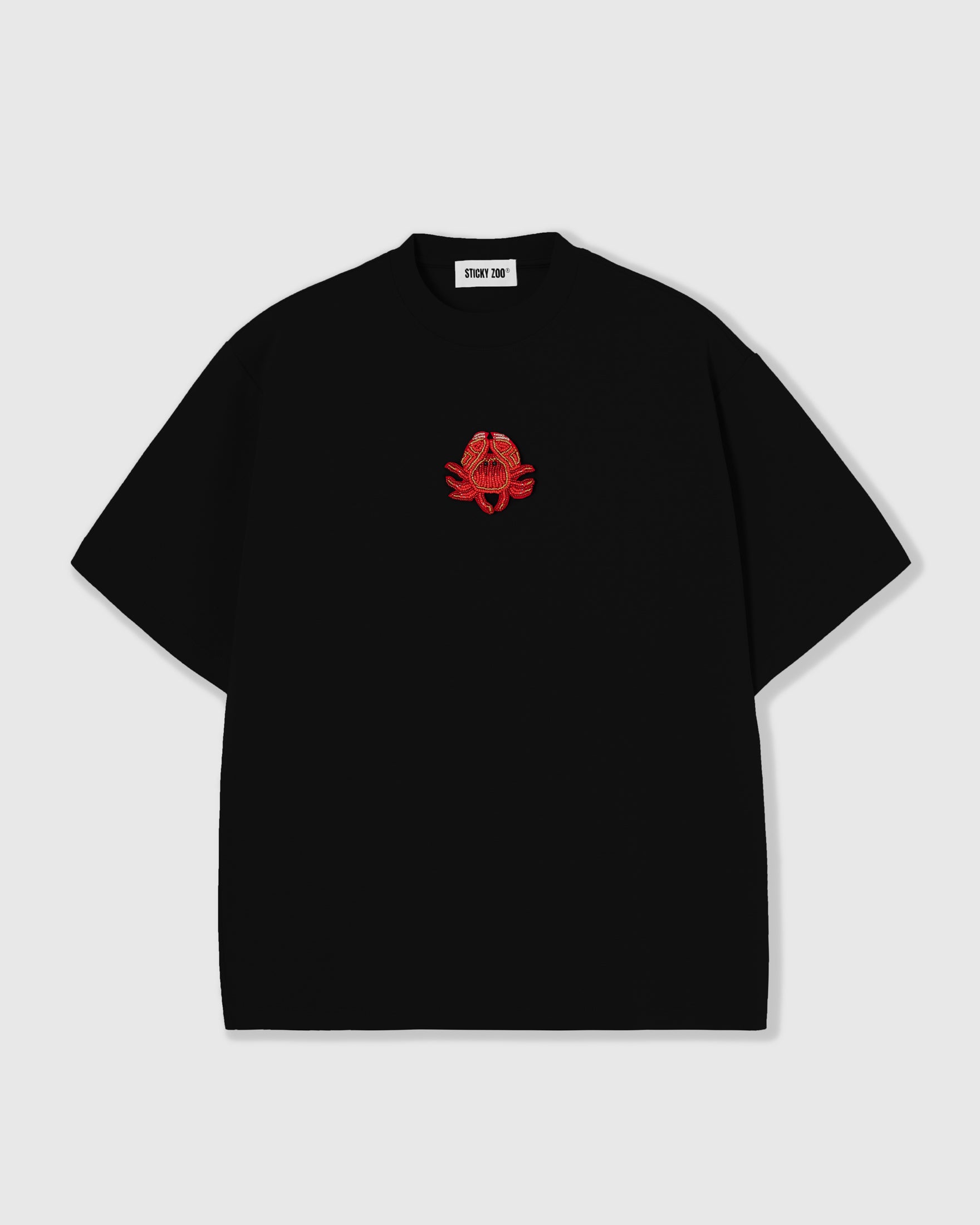 STICKYZOO Crab T-Shirt in black with a hand-beaded red crab applique on 230gsm cool-touch cotton, oversized boxy fit.