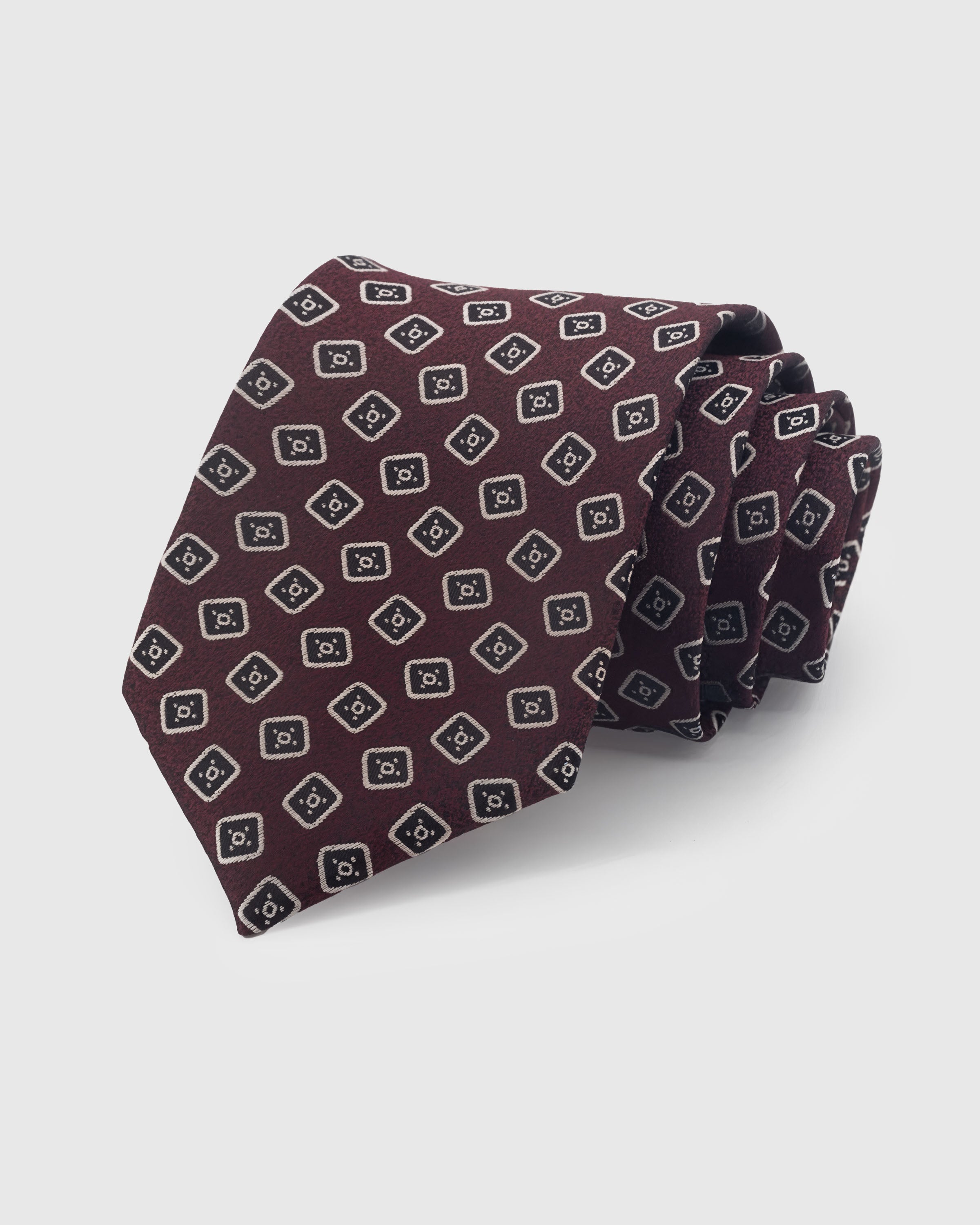 {100% mulberry silk weave} STICKYZOO BURGUNDY SQUARE FOULARD TIE in hand-embroidered mulberry silk with square foulard motif, 45° bias-cut Italian method