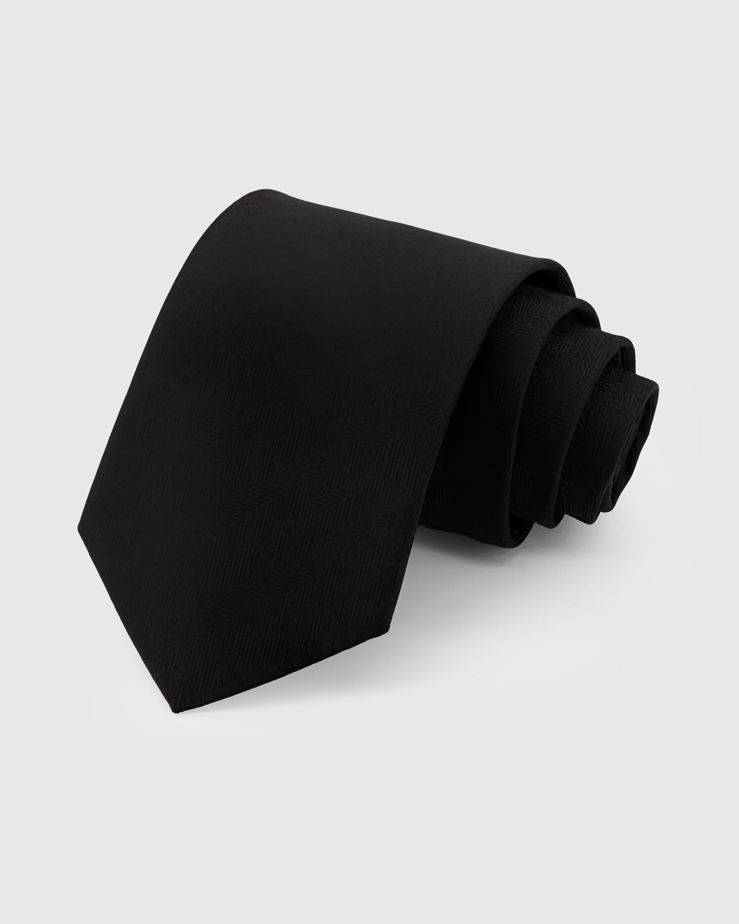 STICKYZOO Onyx Herringbone Tie in mulberry silk with tonal herringbone weave on onyx ground, 45° bias-cut Italian method