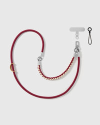 Cross-body phone strap shown with its universal phone-tab connector and safety tether