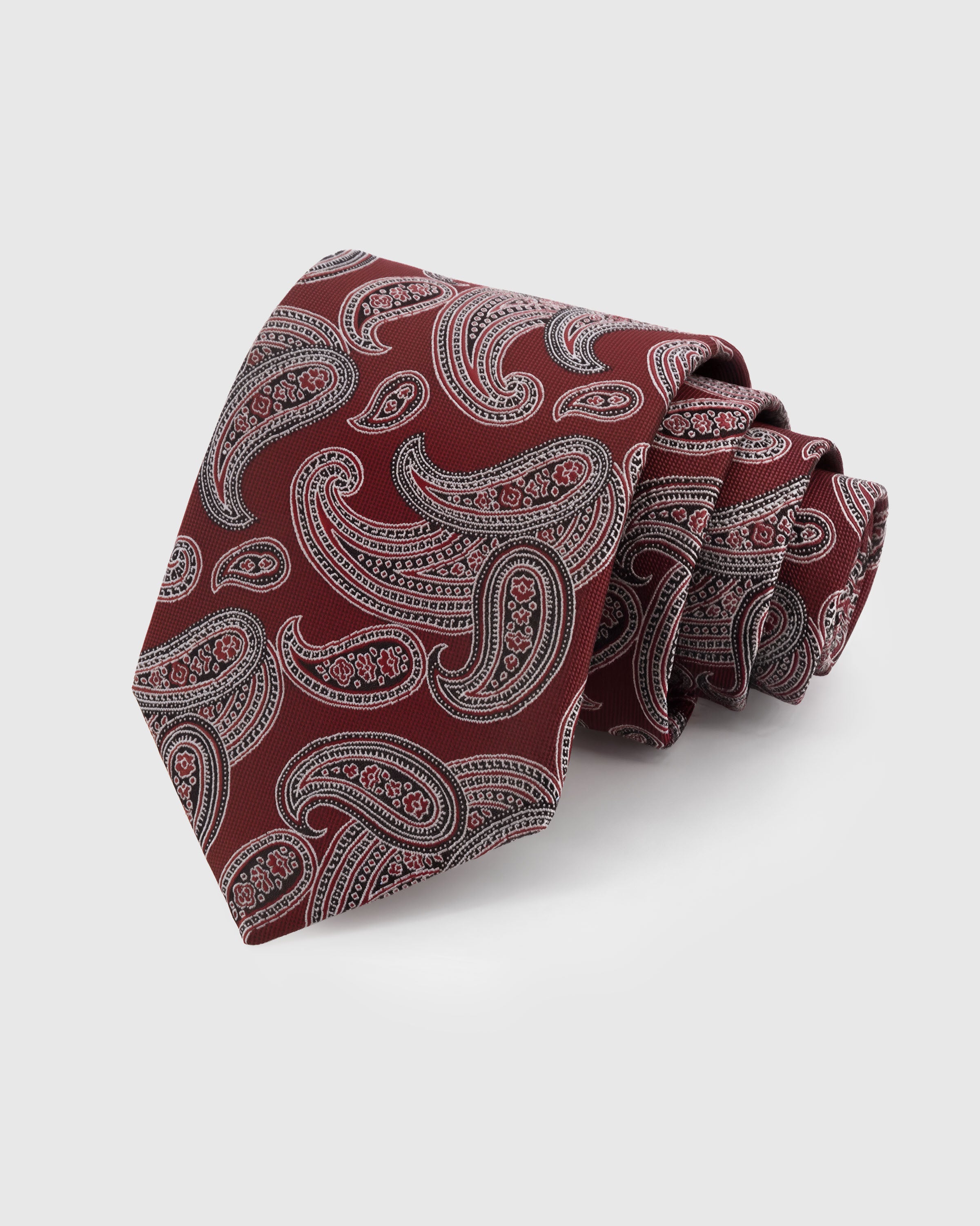 STICKYZOO GARNET PAISLEY TIE — 100% mulberry silk with hand-embroidered intricate silver-toned paisley scrollwork on rich garnet red ground
