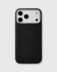 Black fine-grain vegan leather iPhone case with a raised silver metal camera frame by STICKYZOO