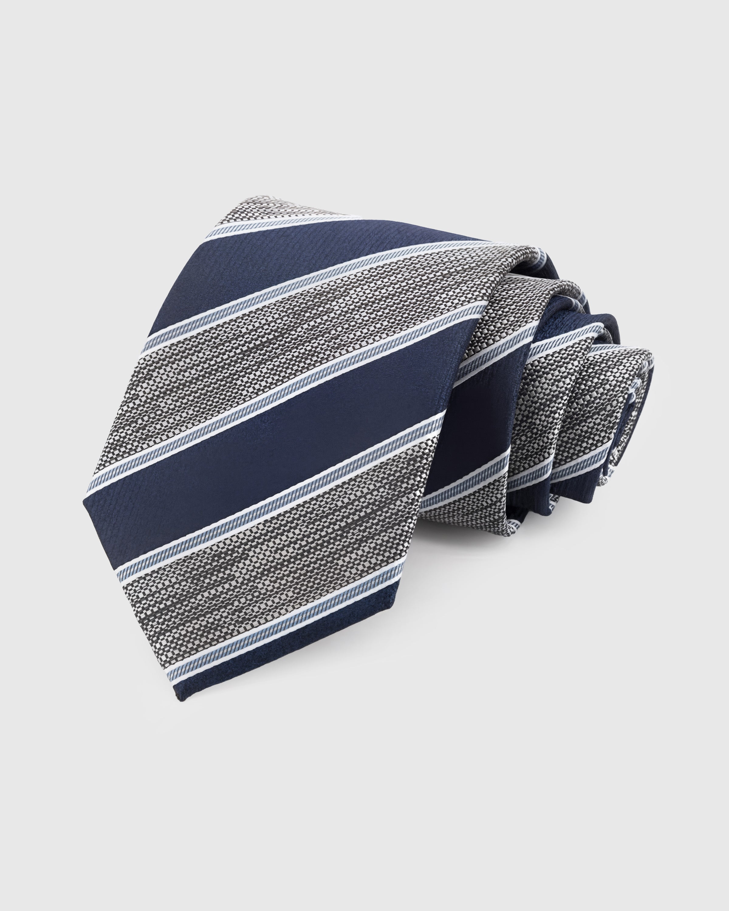 STICKYZOO Navy Silver Stripe Tie in hand-embroidered mulberry silk with woven navy and silver textured stripes, 45° bias-cut