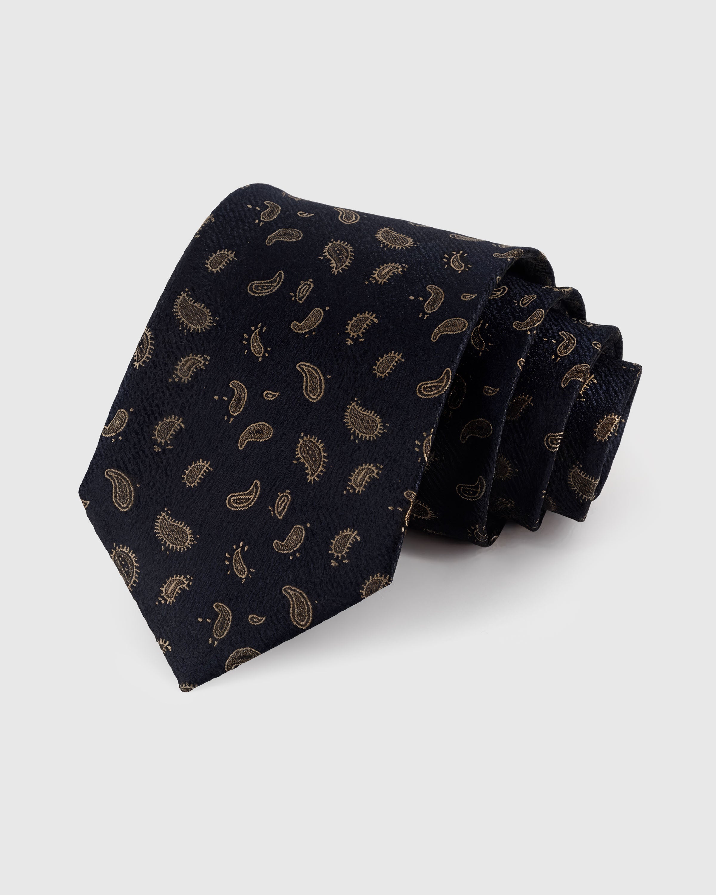 STICKYZOO NOIR SCATTERED PAISLEY TIE — 100% mulberry silk with hand-embroidered gold-toned scattered miniature paisley drops on deep black with textured weave ground