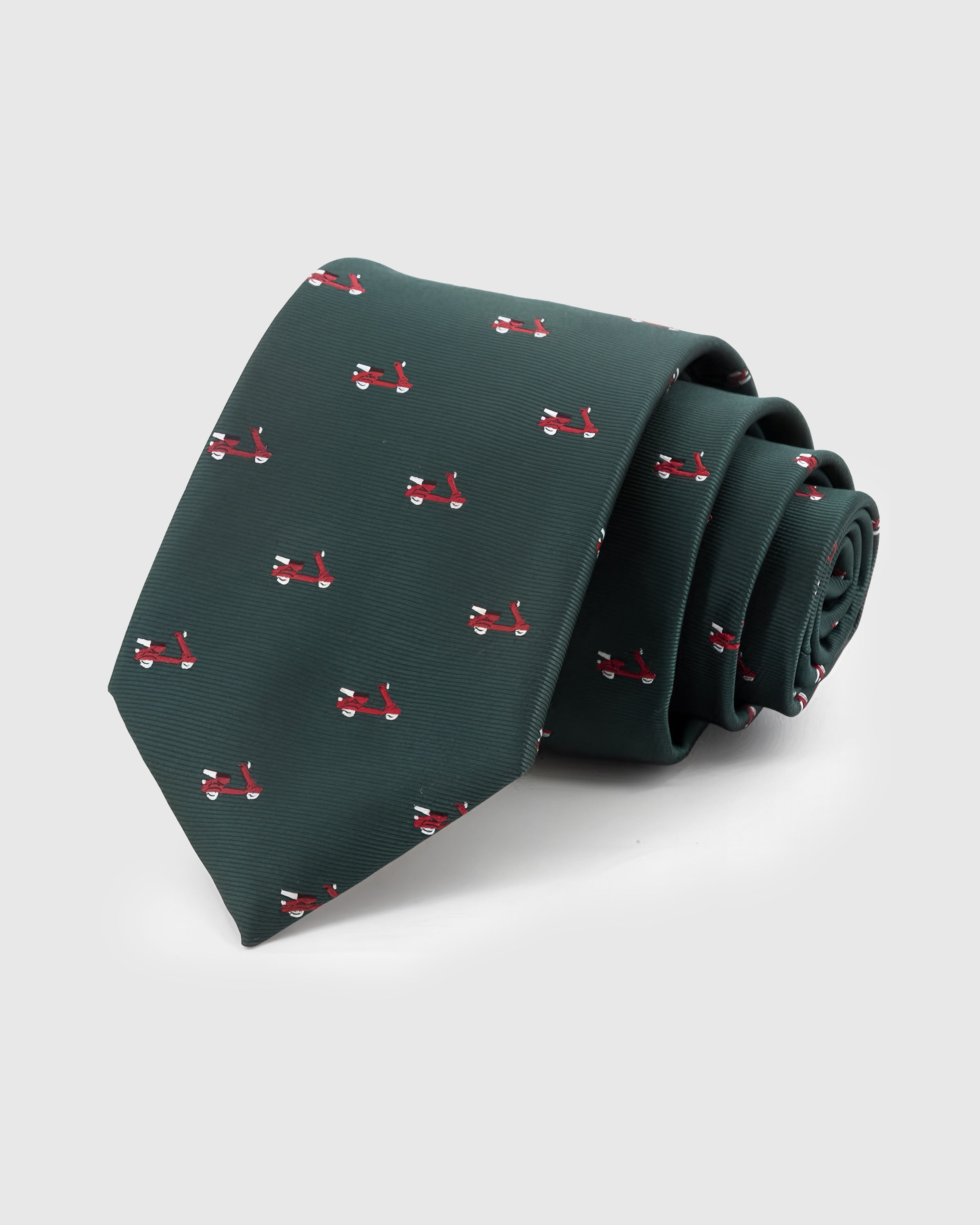 EVERGREEN VESPA TIE — Hand-embroidered scooter detail on 100% mulberry silk in evergreen, showing embroidery texture and silk sheen