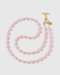 Full-length STICKYZOO cross-body phone strap strung with high-gloss baby-pink resin nugget beads with a soft blush swirl