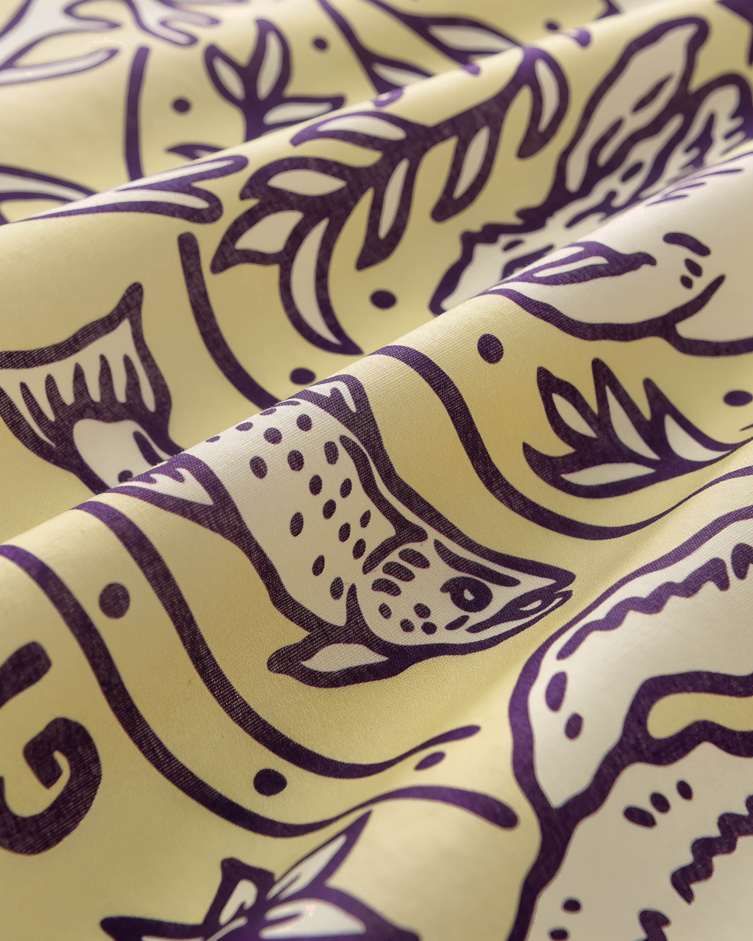 STICKYZOO wildwood charm silk scarf print detail showing the hand-illustrated trout swimming across the field
```
