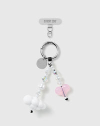 STICKYZOO Dream Cloud phone strap: white cloud bead and pink jelly heart on a beaded wrist strap with faux-pearl beads, silver-tone ring and card.