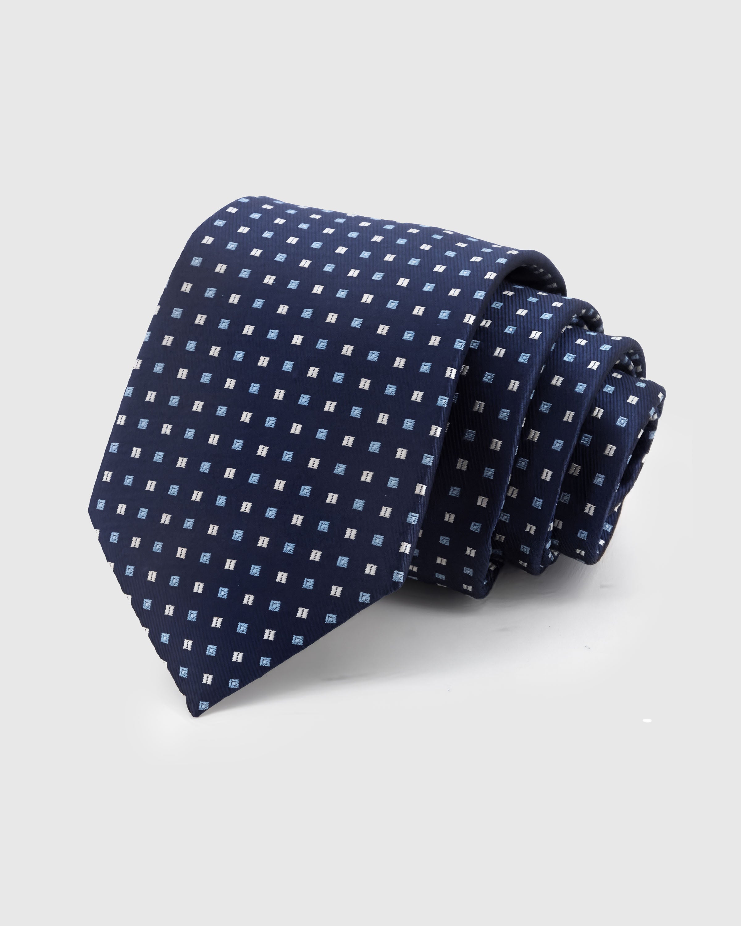 STICKYZOO Navy Mosaic Tie — hand-embroidered navy / sky blue mulberry silk with grid dot mosaic pattern