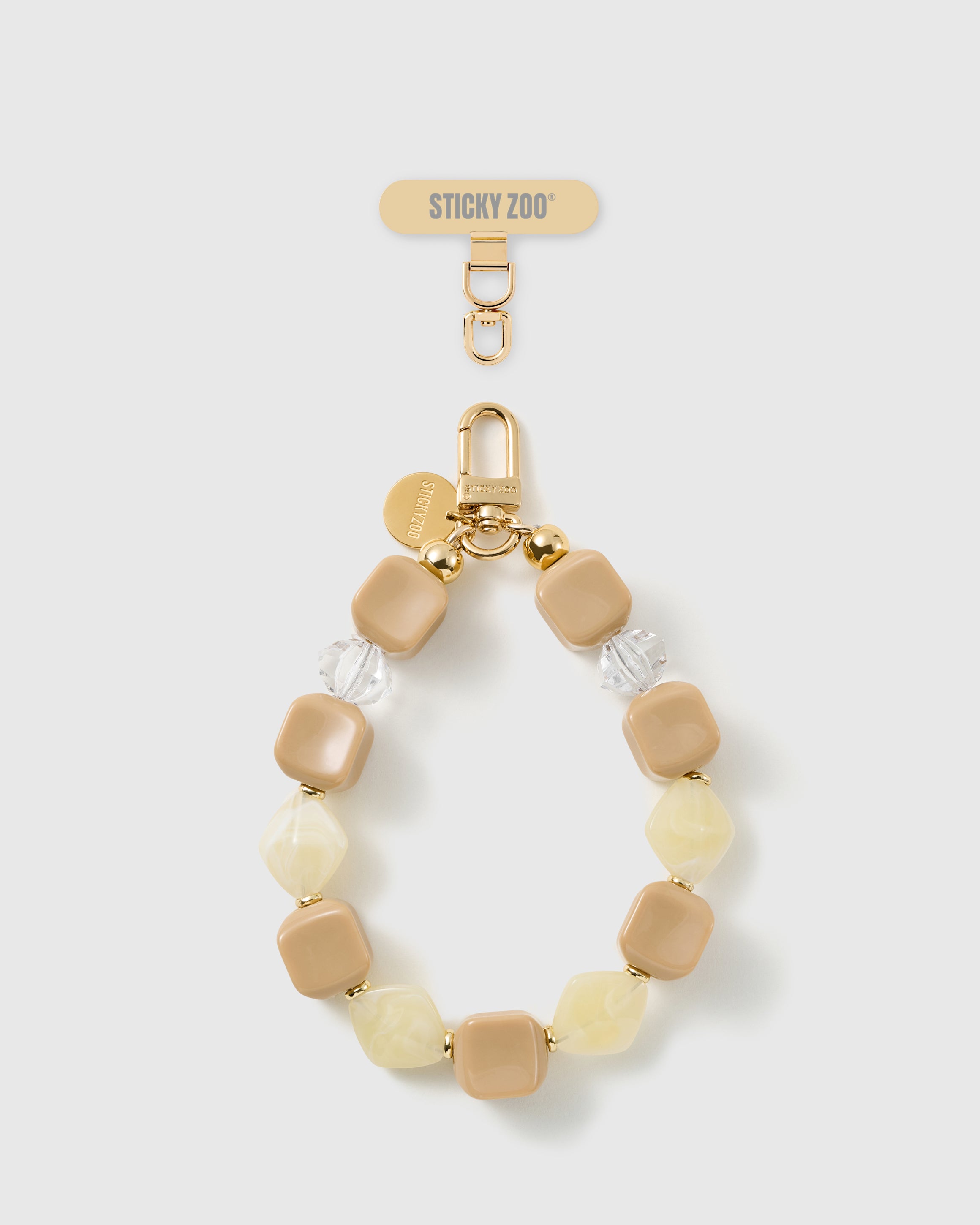 Handmade latte marbled bead phone strap by STICKYZOO with 18K gold-plated engraved hardware