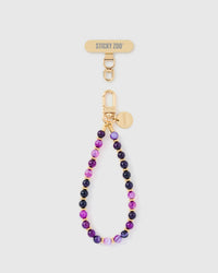 Handmade purple and magenta agate stone phone strap with gold-plated engraved hardware by STICKYZOO