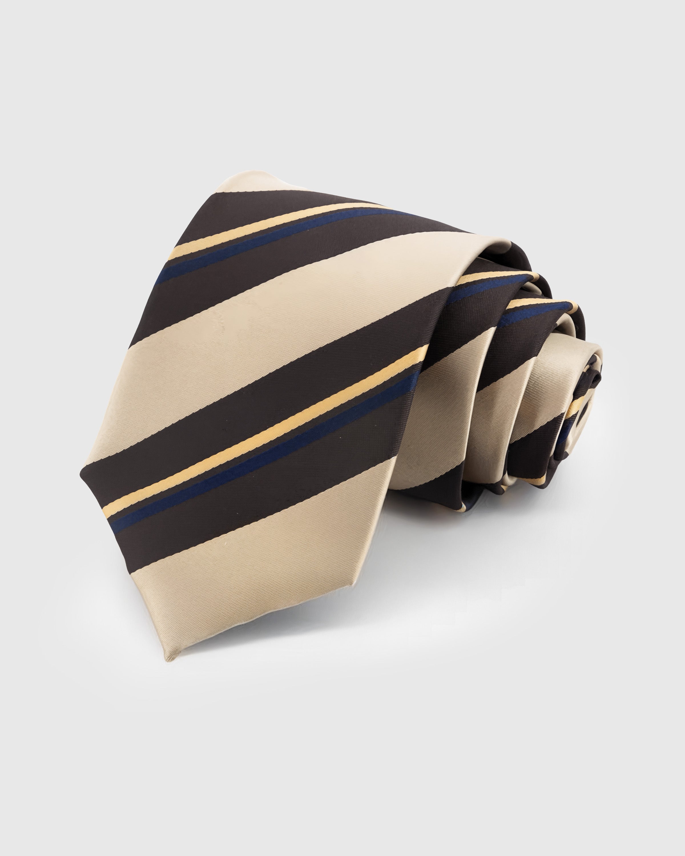SANDSTONE REGIMENT TIE — Hand-embroidered diagonal stripe detail on 100% mulberry silk in sandstone, showing embroidery texture and silk sheen