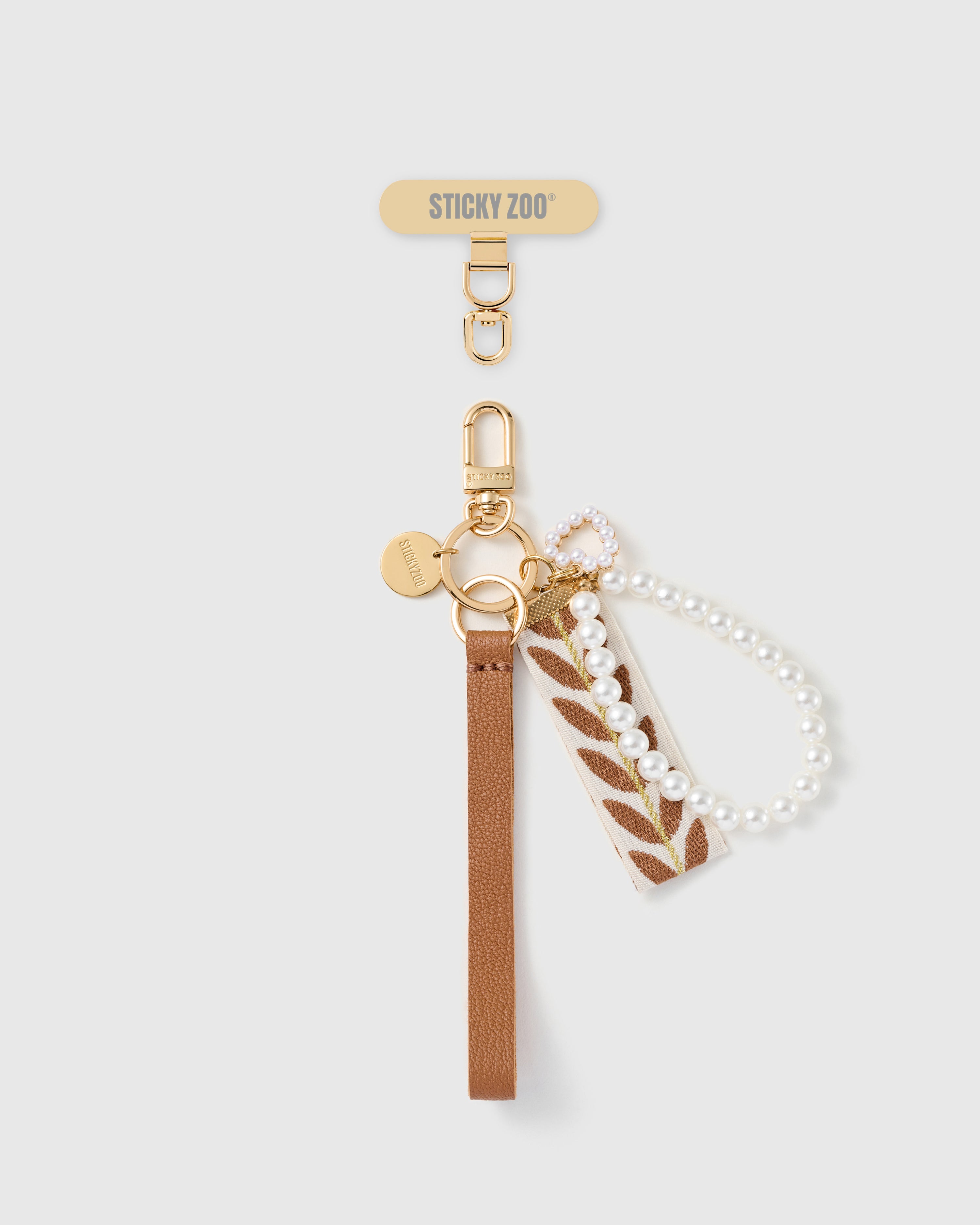 Handmade French Alran cocoa tan leather phone strap with hand-knotted pearl strand and embroidered vine ribbon, 18K gold STICKYZOO hardware