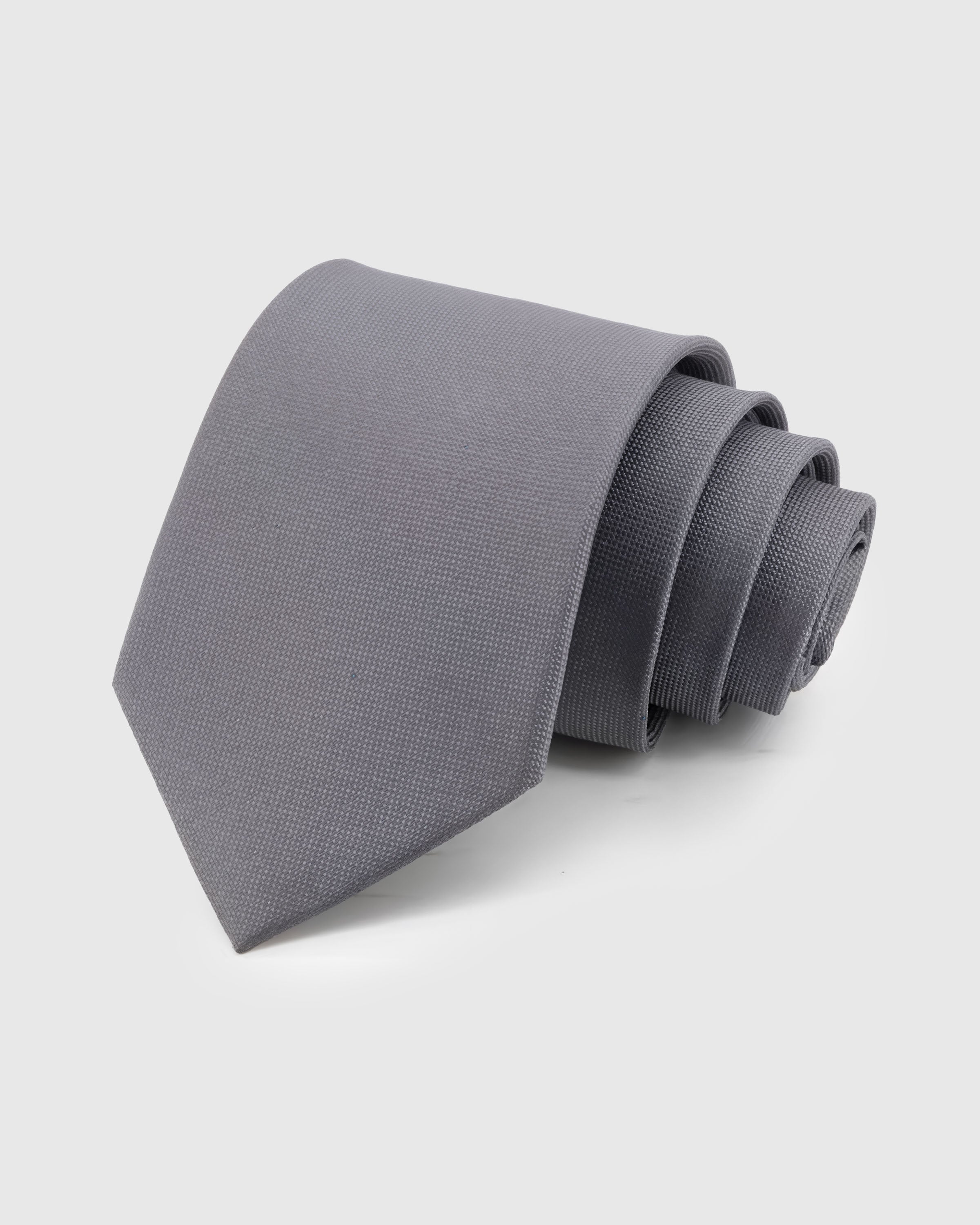 STICKYZOO Pewter Silk Tie — hand-embroidered pewter grey mulberry silk with solid textured pattern
