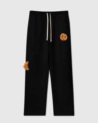 STICKYZOO DOUBLE CROISSANT PLUSH SWEATPANTS in Black featuring 2 hand-stitched plush croissants, designed in Amsterdam