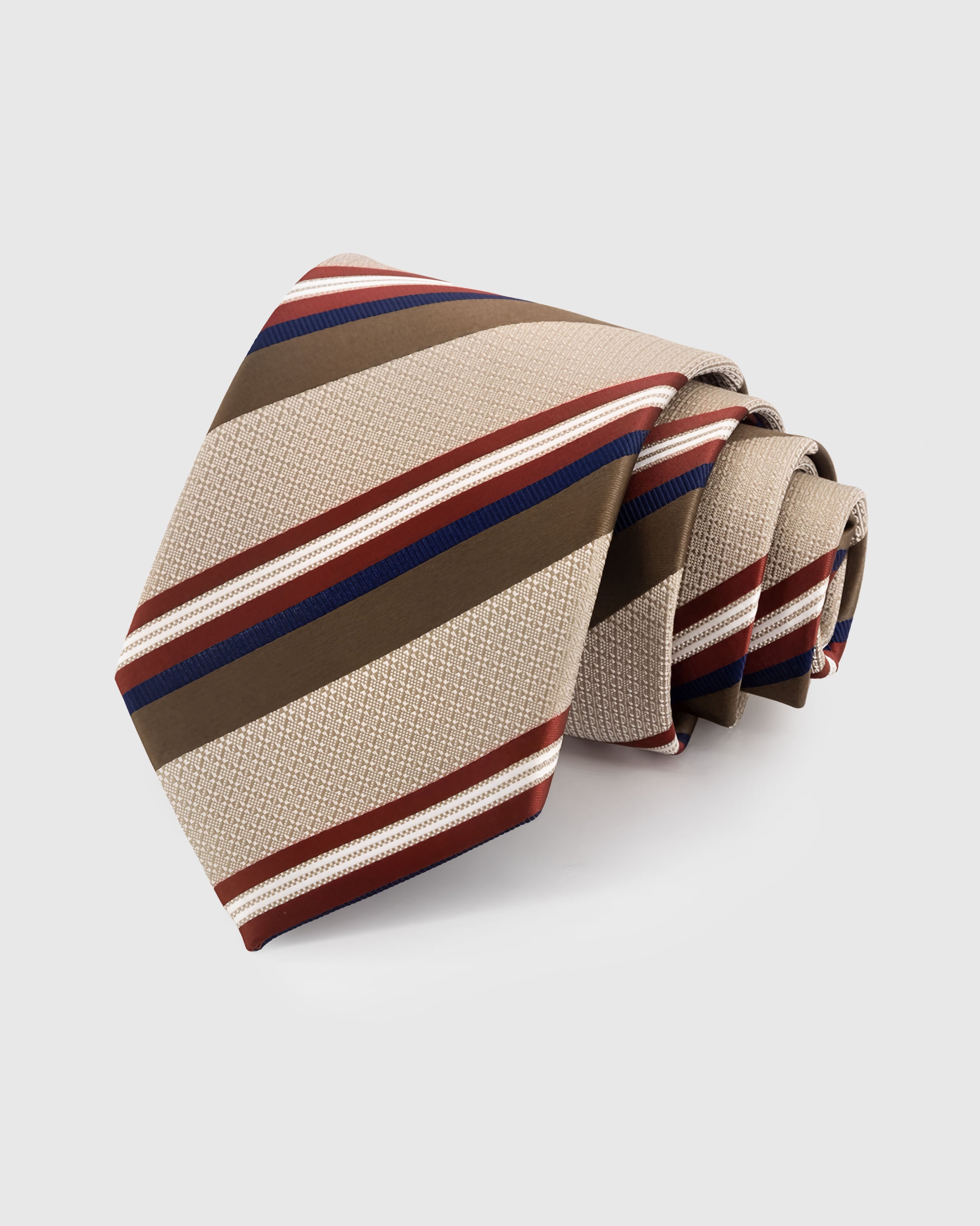 STICKYZOO SAND REGIMENT TIE — 100% mulberry silk with hand-embroidered multi-stripe bands in crimson, olive, and navy on sandy beige with textured weave ground