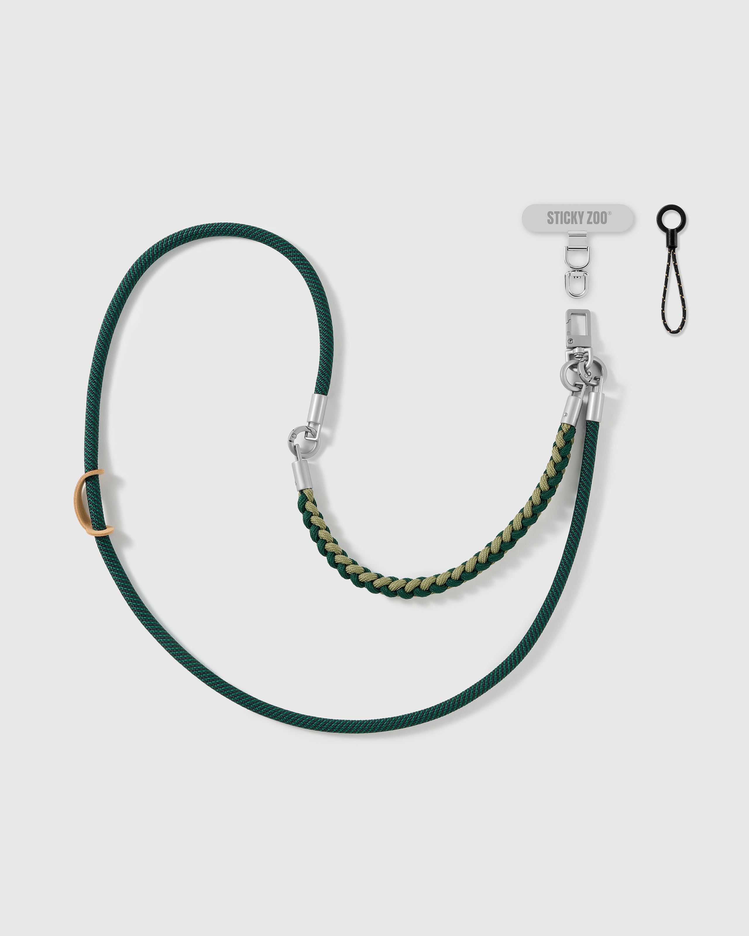 pine braided phone strap by STICKYZOO, worn as a wrist strap or cross-body, with silver-tone swivel hooks, a phone-tab connector and safety tether