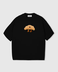 Full colorway range of Runaway Croissant T-Shirts with hand-stitched plush detail